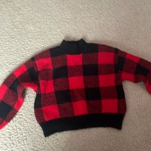 Black and red art class sweater.
